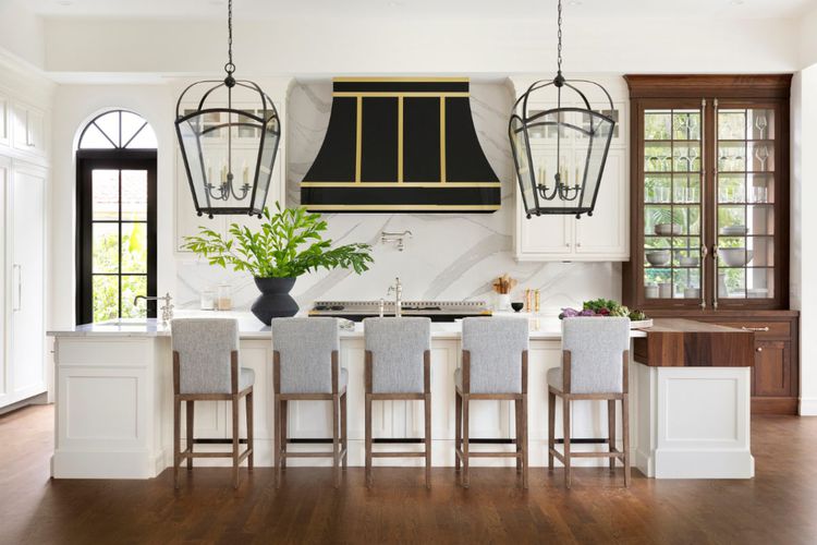 Kitchen cabinetry under pendant lighting
